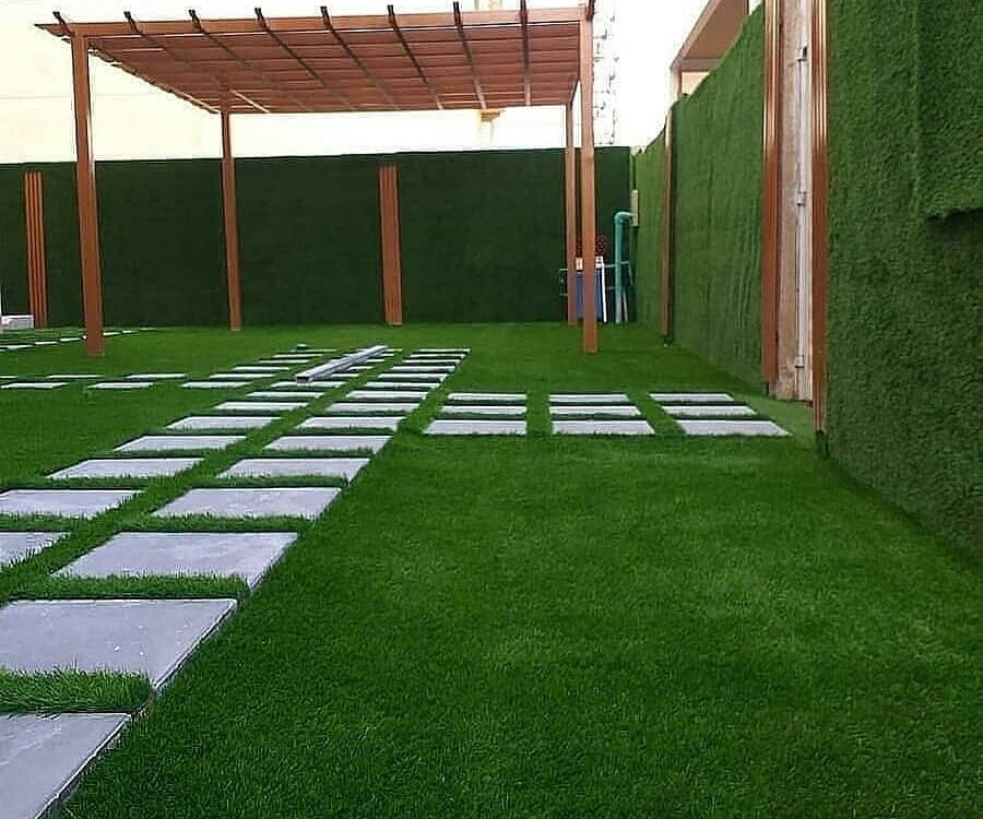 تركيب عشب صناعي بحائل